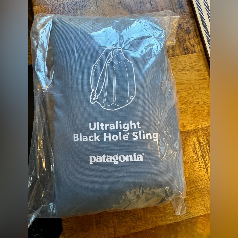 Patagonia Ultralight Black Hole® Sling 8L. Please note color is teal and gray.